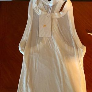 White tank with tags on it